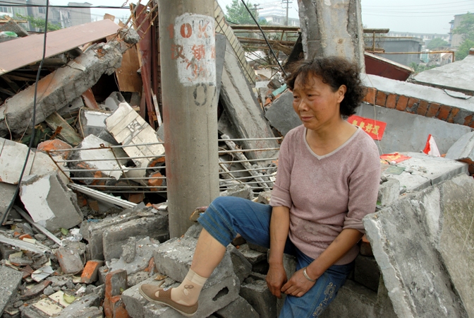 Grieving Woman, Wu Hezheng, Sichuan, China, May 17, 2008, digital photograph