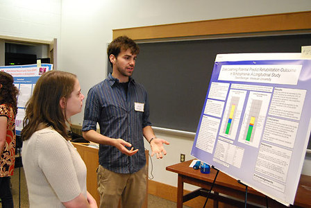 David Baranger '10 talk about his research, "Does Learning Potential Predict Rehabilitation Outcome in Schizophrenia," to Barbara Juhasz, Assistant Prof. of Psychology