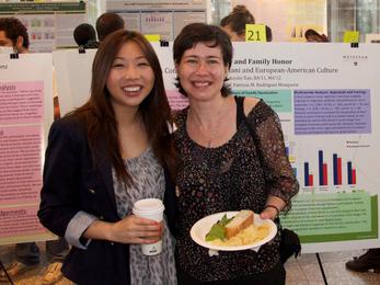 Leslie Tan posing with her adviser Prof. Patricia Rodriguez Mosquera. Tan's research, "Culture and Family Honor - A Comparison of Pakistani and European-American Culture"