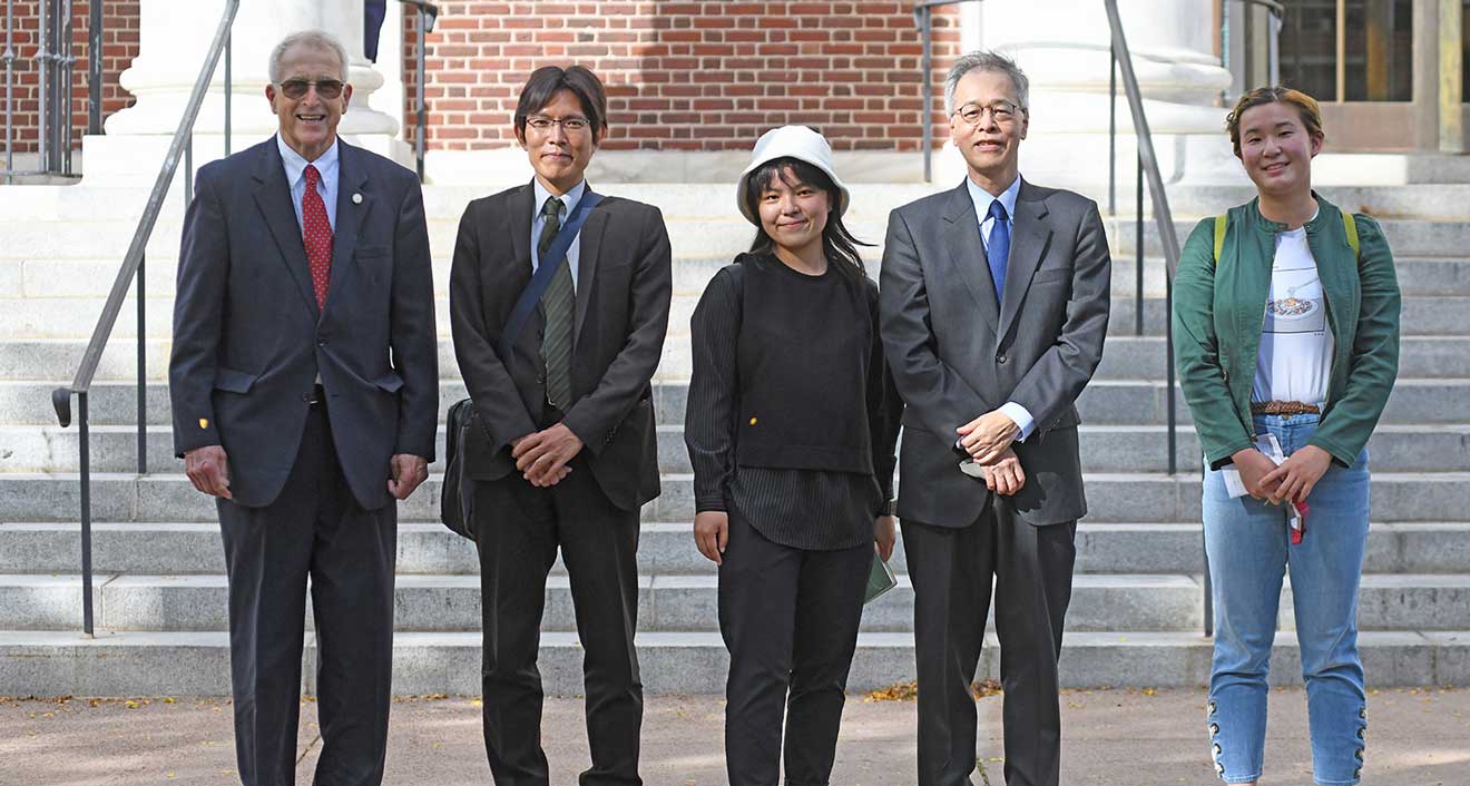 Gregory Boyko, honorary Consul General of Japan in Connecticut; Hideshige Sakurai, assistant to the Consul General of Japan in Boston; Ann Zhang ’22; Setsuo Ohmori, Consul General of Japan in Boston; and Felice Li ’25 gathered in front of Olin Library during a student-led campus tour (in Japanese) on Oct. 14.