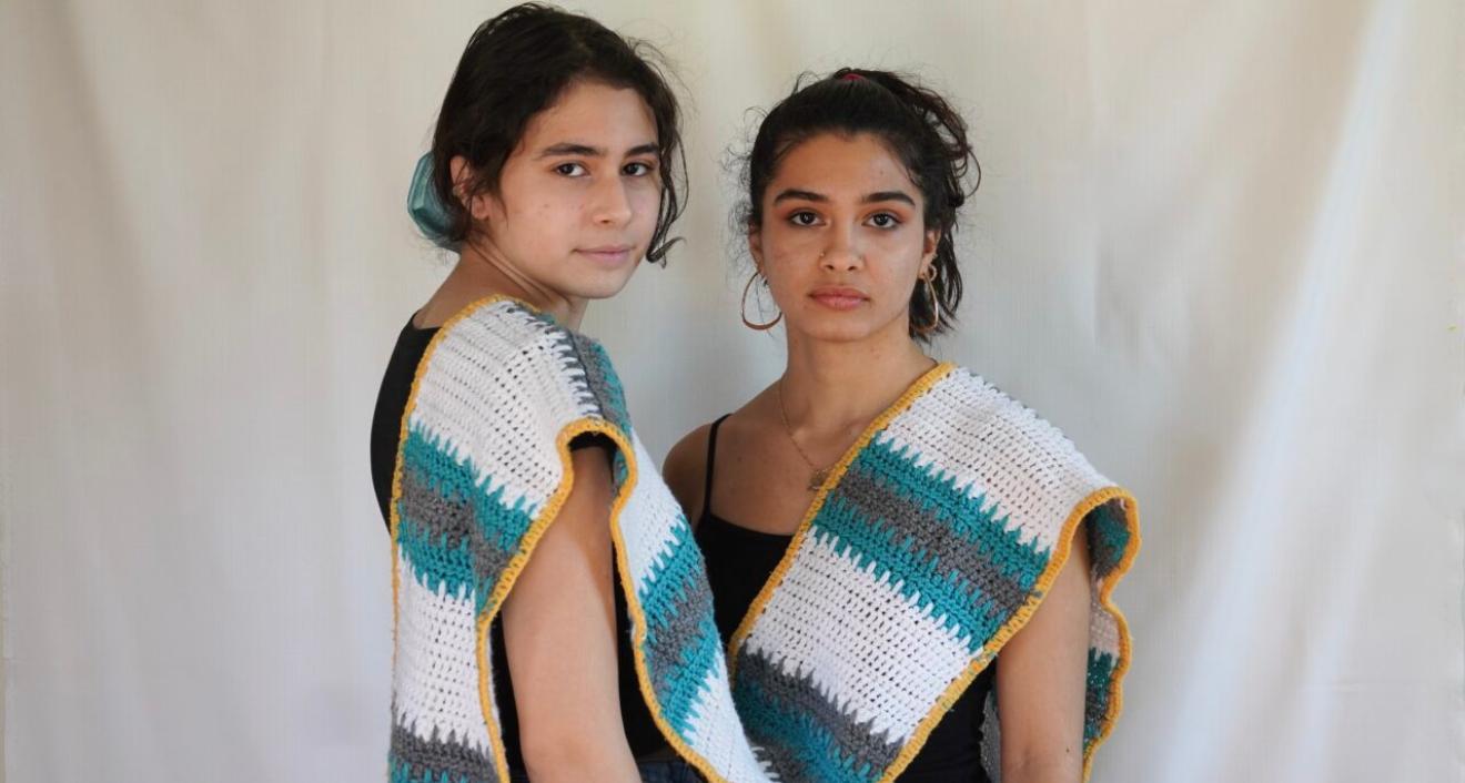 Alanah Kaylie Cedeño (sister of founder) and Ivanie Lucía Cedeño ’22 (founder of Sol Blossom Crochet)