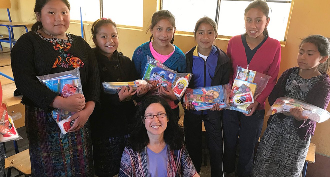 Diane Goldstein Stein ’81, P’16,’21, center, is spearheading a benefit concert for Guatemalan girls and women on Feb. 27. The Tapestry of Music concert will feature music from around the world including Wesleyan student and alumni musicians.