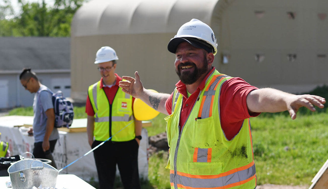 Eric Lamore, site supervisor at Enterprise Builders Inc (EBI), spoke about the new Neighborhood Preschool building on Long Lane during an NPS field trip on May 23.