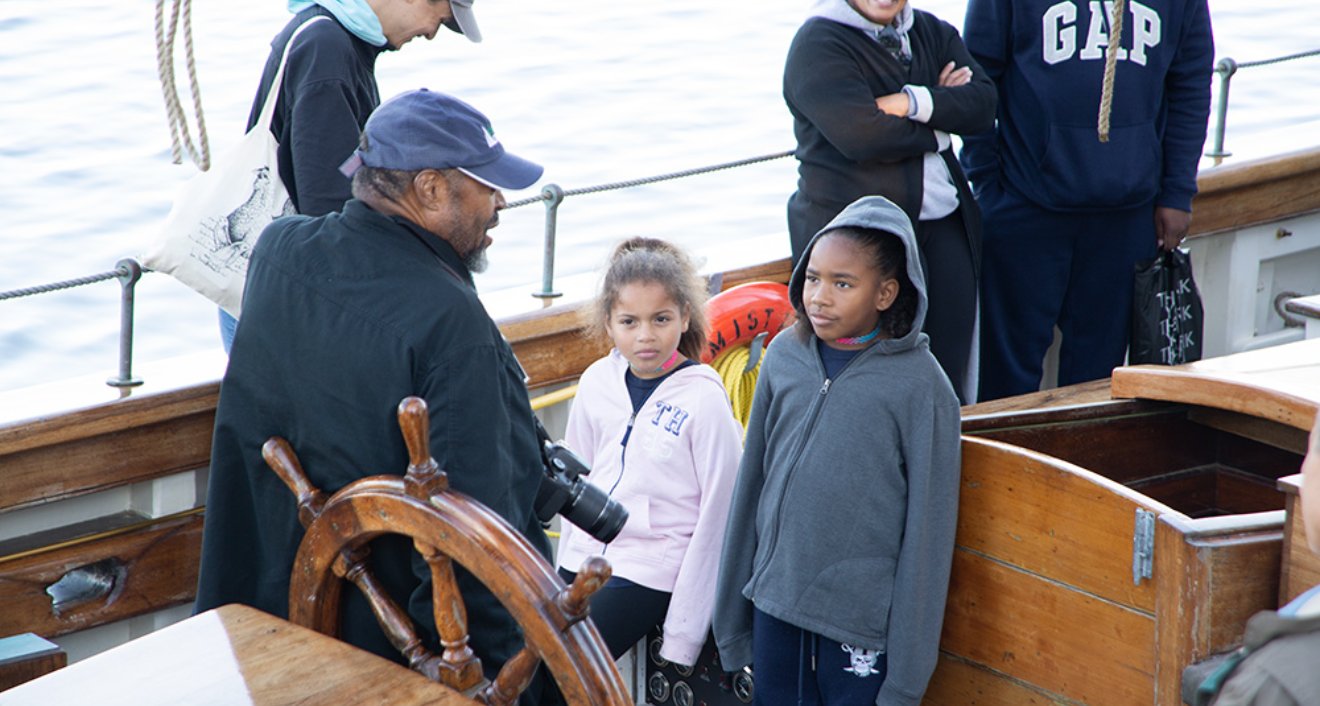 Discovering Amistad educators teach children about the vessel. Photo by Amy Albert