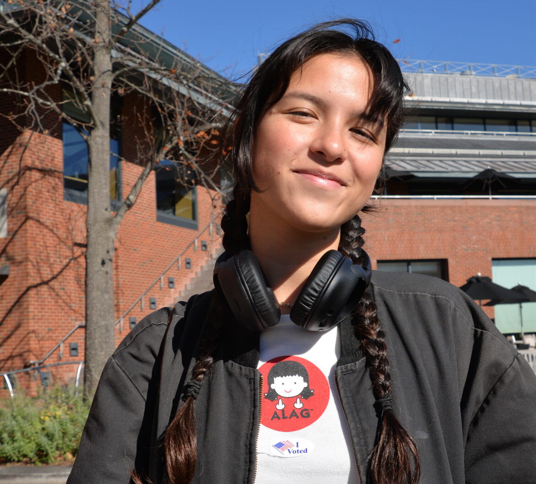 Saskia Currey wears an ‘I Voted’ sticker outside of Fayerweather Hall, November 8th, 2022. Photo by Amy Albert