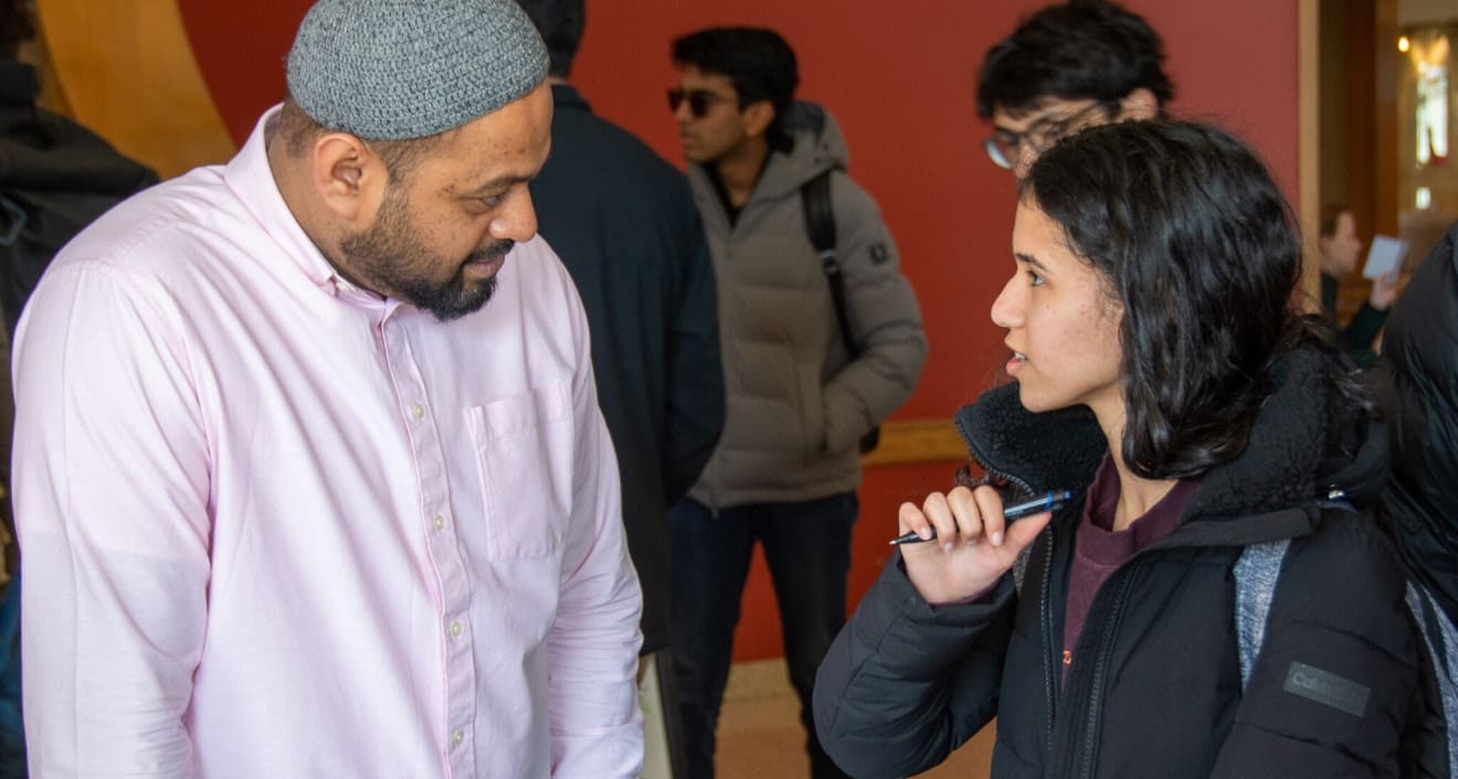 Shaykh Jamir Meah speaking to a student. Photo by James Sims.