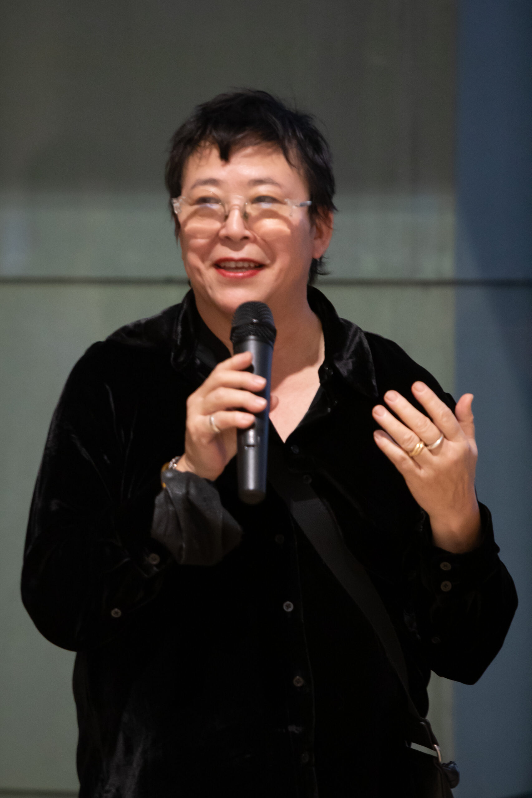 Carrie Yamaoka ’79 speaks at the opening reception for her exhibition “seeing is forgetting and remembering and forgetting again.” Photo by Sandy Aldieri of Perceptions Photography. Image courtesy of Wesleyan University’s Center for the Arts.