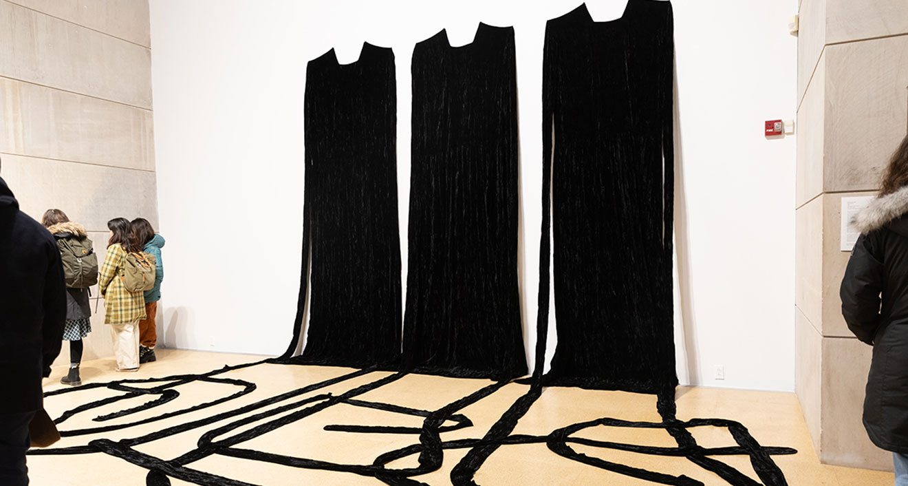 Installation view in the Ezra and Cecile Zilkha Gallery of Beverly Semmes’ “Black Gowns,” 1994, velvet cloth, in three parts, 108 x 192 x 144 in. The work is courtesy of the artist, from the collection of Kahlil Robert Irving. (Photo by Sandy Aldieri of Perceptions Photography. Image courtesy of Wesleyan University’s Center for the Arts.)