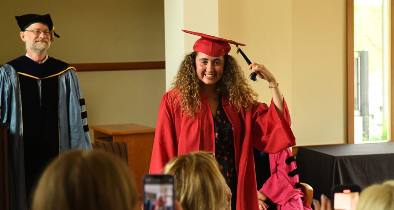 Caitlyn Ferrante ’24 at an individual graduation ceremony in the McKelvey Room at the Office of Admission. Ferrante, a member of the Wesleyan Women’s Tennis team, competed in the finals of the Division III NCAA Tournament over the weekend. (Photo by Maxx McNall)