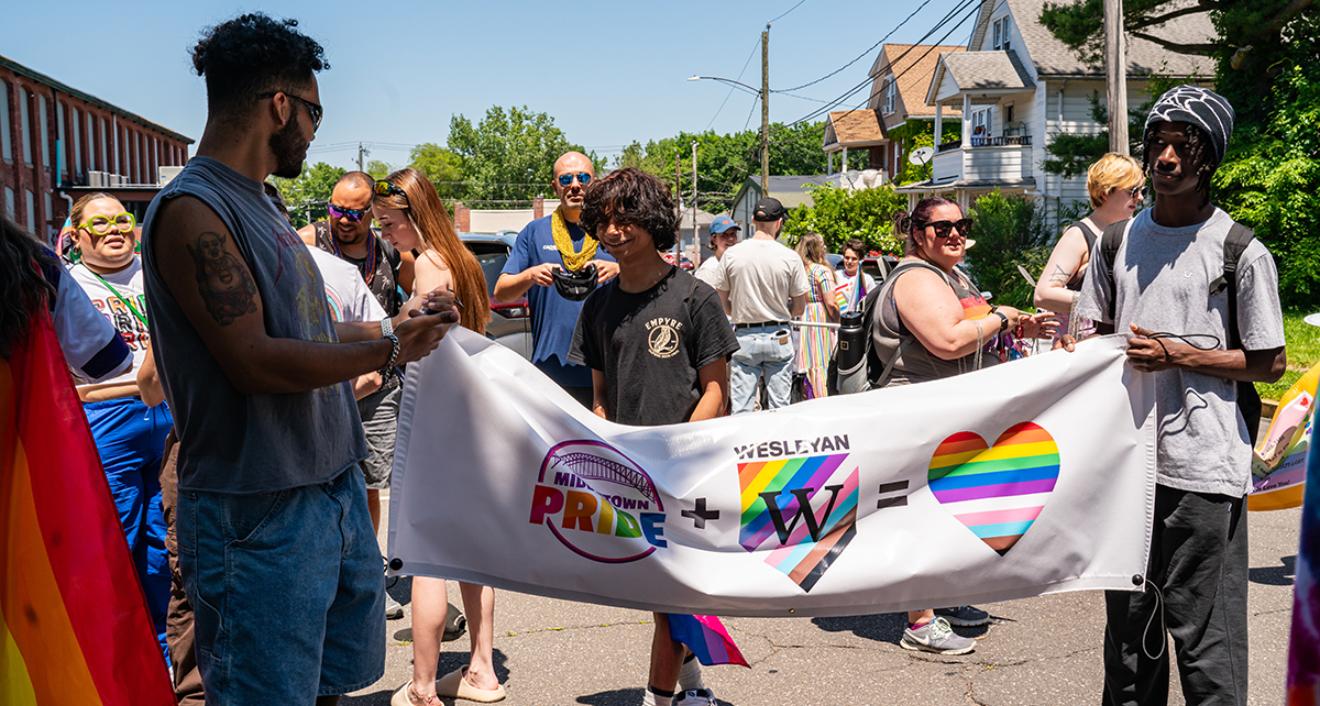 Wesleyan community members walk during the Middletown PrideFEST parade. (Photo by Meka Wilson)