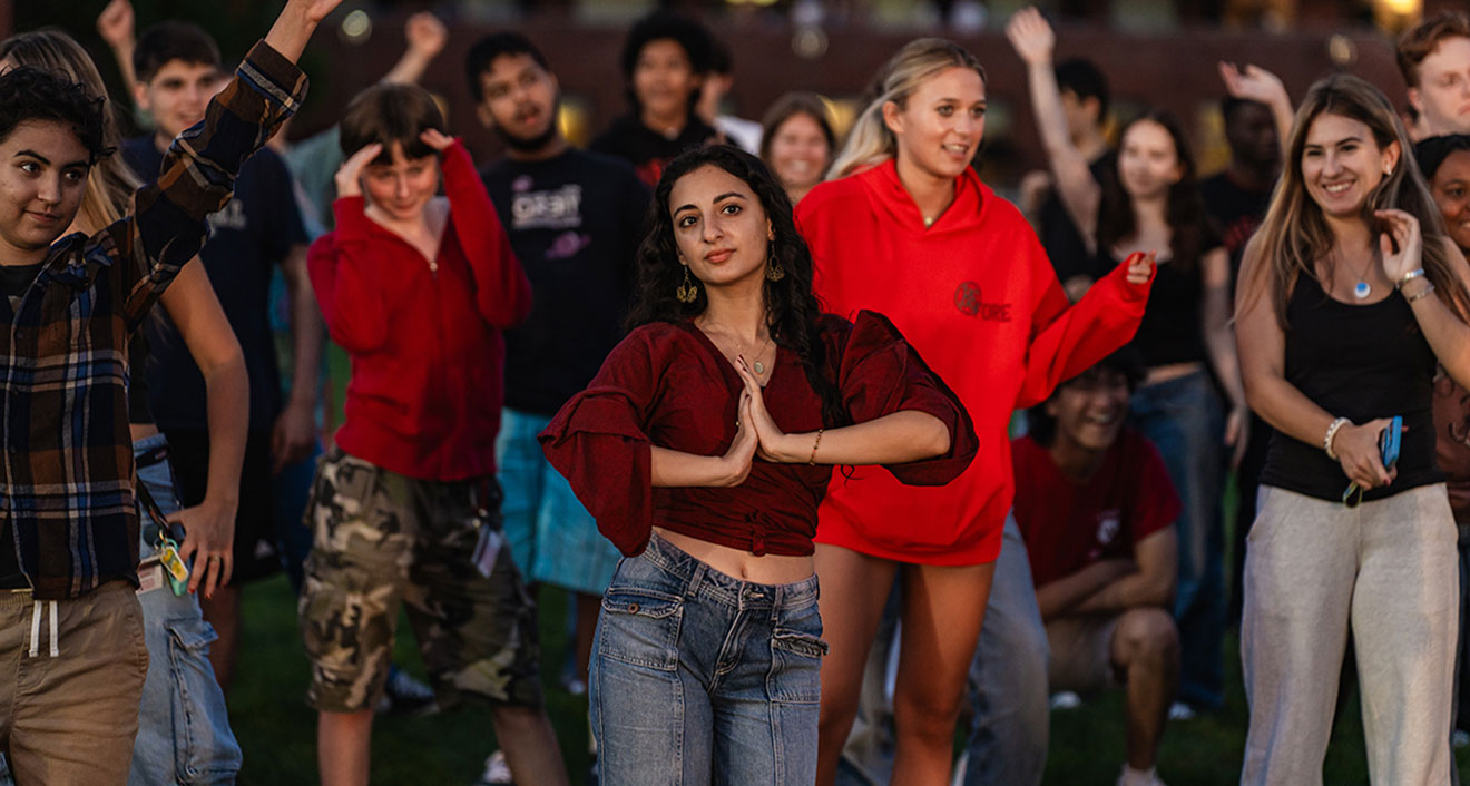 Students from the Class of 2028 dancing at the 17th annual Common Moment. (Photo by Meka Wilson)