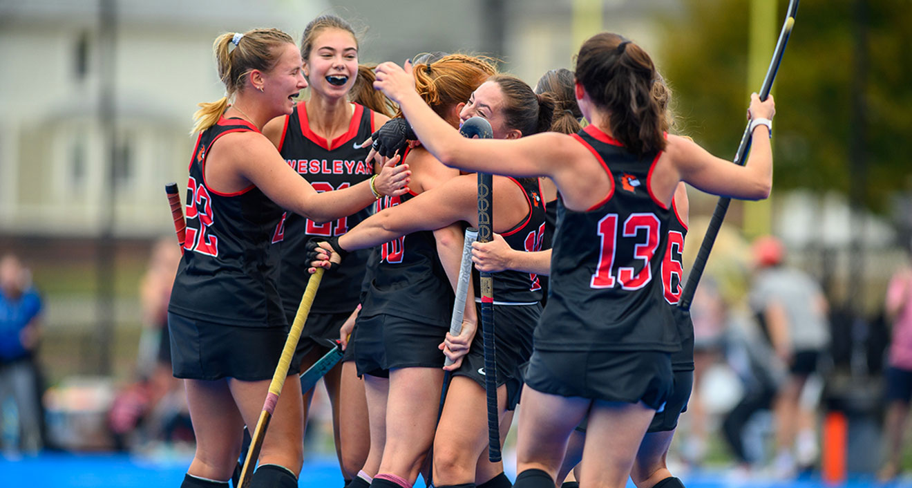 No. 15 Wesleyan Field Hockey celebrates a goal in a 5-1 win over No. 8 Bates on Sept. 21. (Photo by Steve McLaughlin)