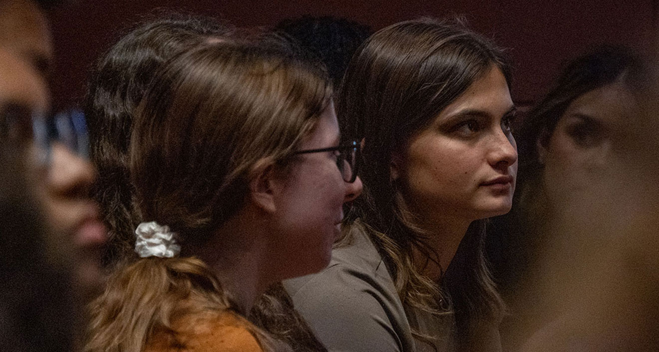 Students from the Class of 2028 listen as author Robin Wall Kimmerer gives a talk about her book Braiding Sweetgrass in the Memorial Chapel. (Photo by Mike Mavredakis)