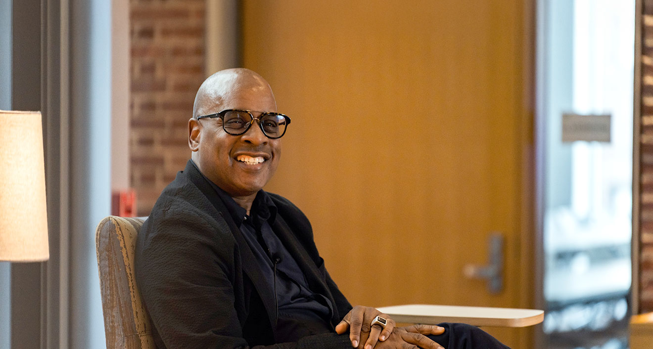 Artist Glenn Ligon during a conversation with Associate Professor of Art History Claire Grace at Homecoming Family Weekend. Ligon's work is on display at the Pruzan Art Center through mid-December. (Photo by Meka Wilson)