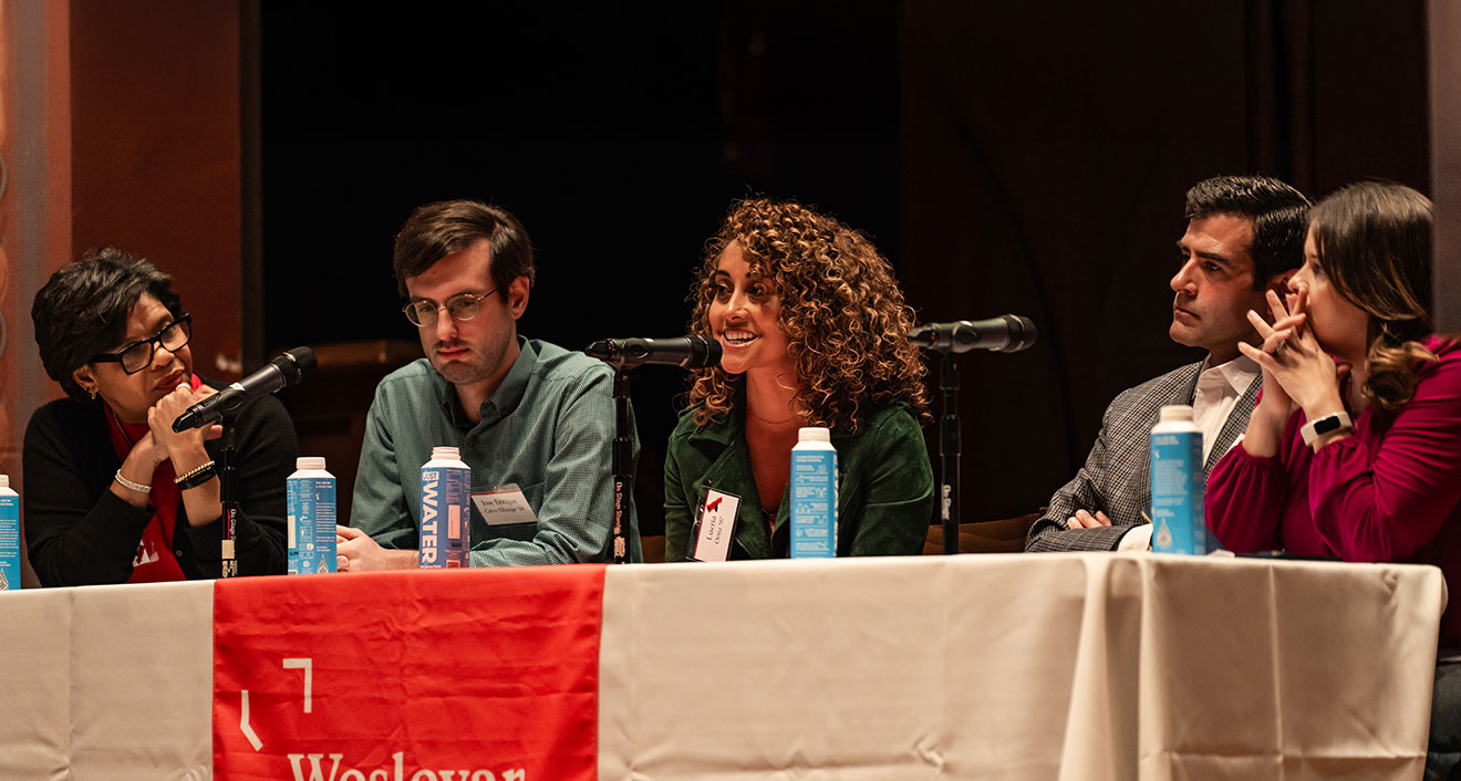 Alumni speakers at the 32nd Annual Dwight L. Greene Symposium in Memorial Chapel, which focused on the role Latine voters could play in the election on Nov. 5. From left to right, the speakers were non-profit executive Charlotte Castillo ’94 (left), political consultant Jose Enrique Calvo Elhuage ’14 (left-center), non-profit executive Lucria Ortiz ’97 (center), journalist Maria Santana Guadalupe ’98 (right), and attorney Diego Ibarguen ’97 (right-center). (Photo by Meka Wilson)
