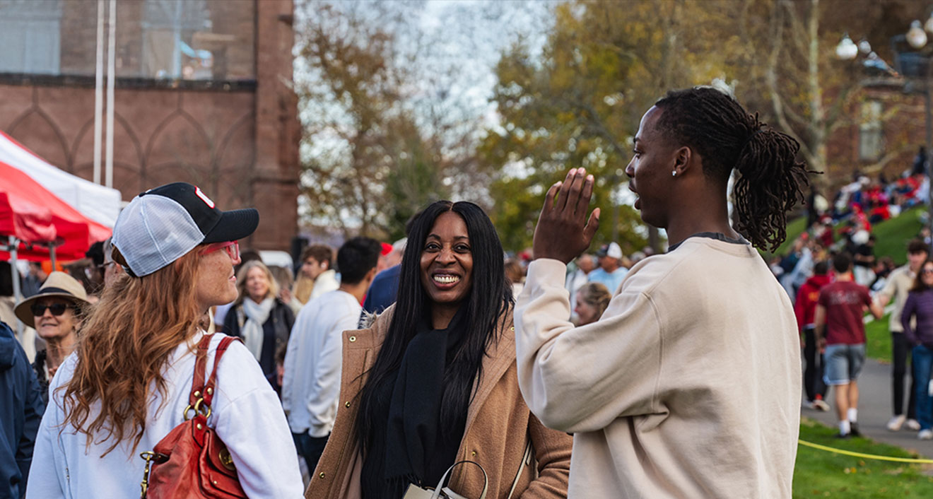 Attendees gather at the tailgate on Saturday at Homecoming and Family Weekend. (Photo by Meka Wilson)