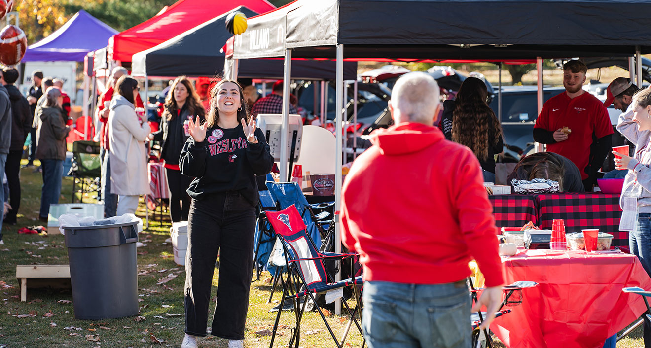 Wesleyan families tailgate before the football game during Homecoming and Family Weekend. (Photo by Meka Wilson)