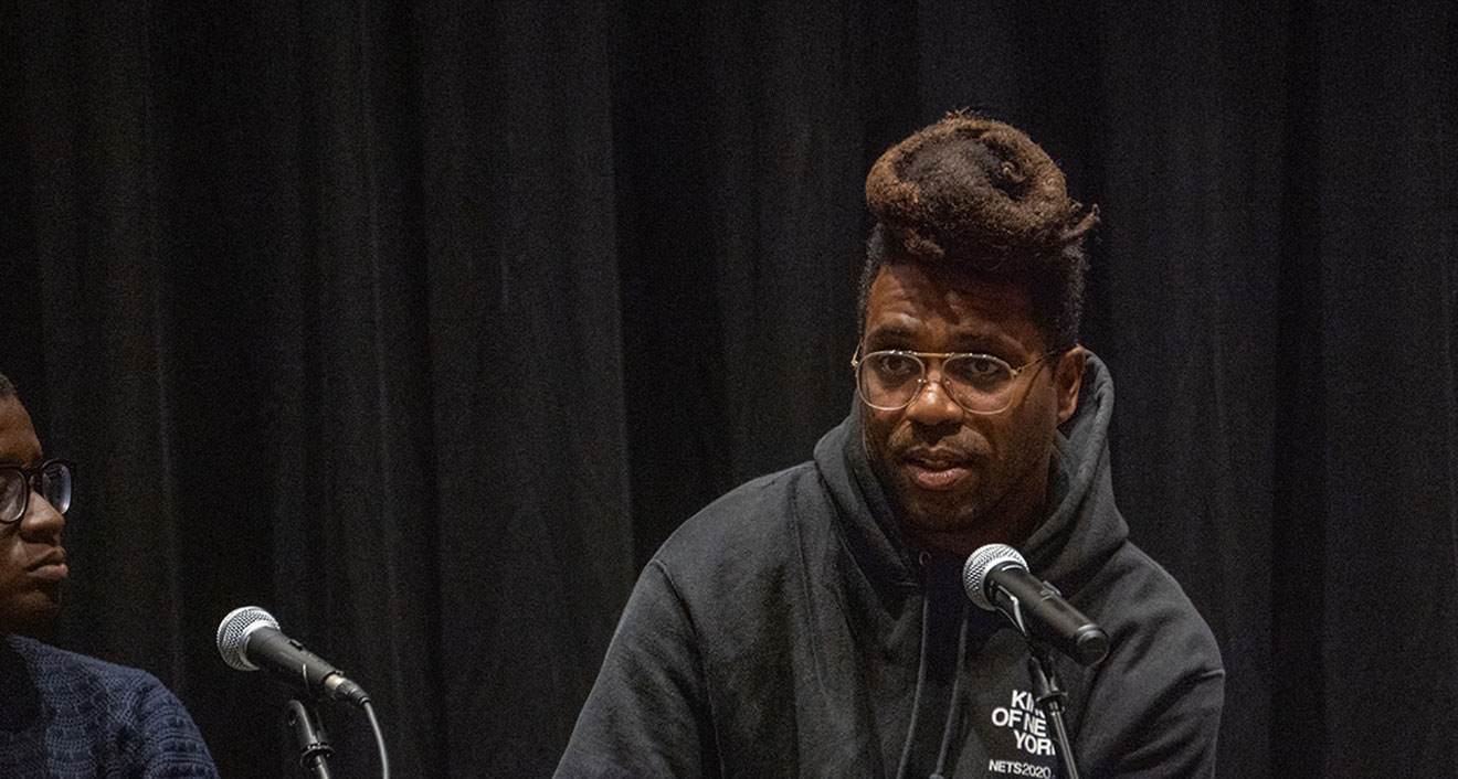 Director Shaka King, who created Academy Award-nominated film Judas and the Black Messiah, speaks at a panel during the Shasha Seminar for Human Concerns on Nov. 9. (Photo by Mike Mavredakis)