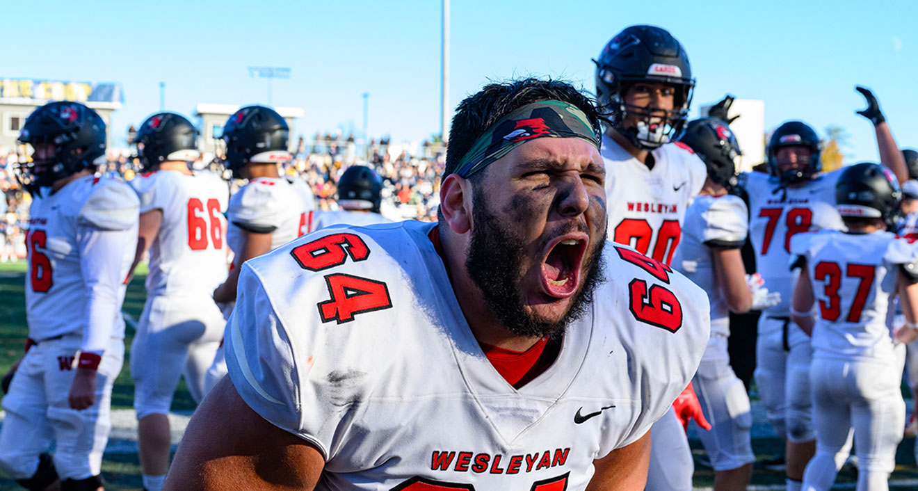 Offensive lineman Will Aaronson ’25 gets excited during the NESCAC Championship, which Wesleyan won outright for the first time. (Photo by Steve McLaughlin)
