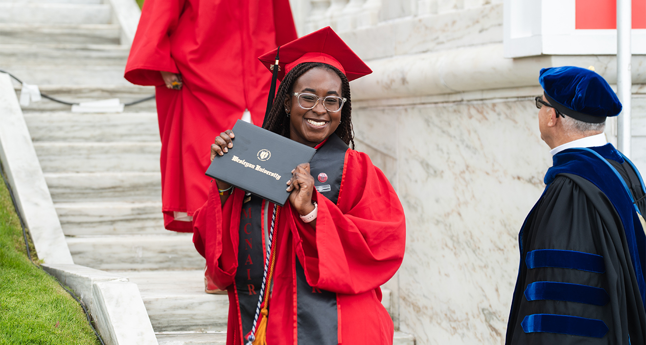 Student with diploma