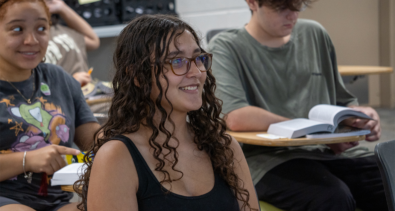 Upward Bound student enjoys a reading class.