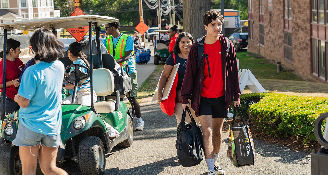 Photo of first-year students carrying their bags on Arrival Day