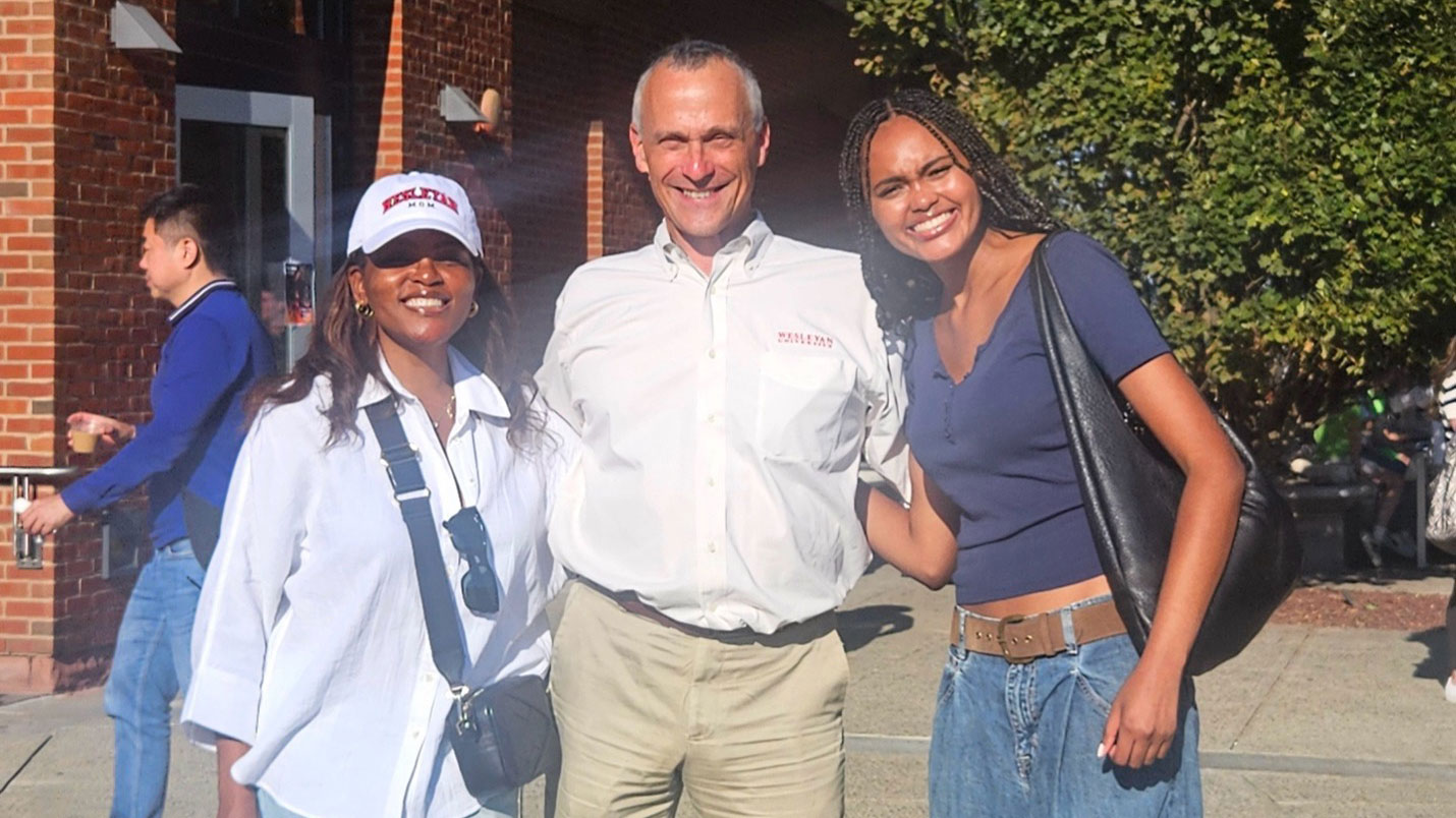 President Roth with students.