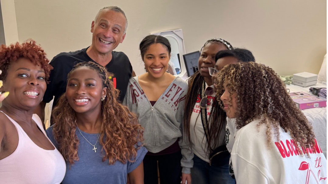 President Roth with students.