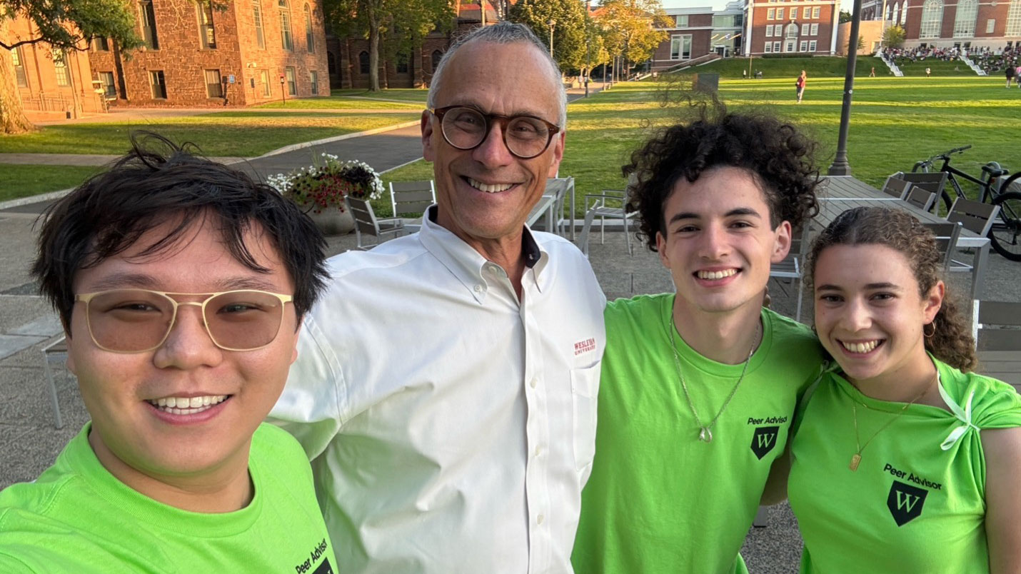 President Roth with students.