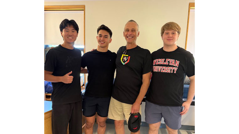 President Roth with students.