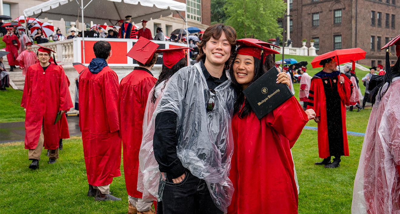 Two students at commencement