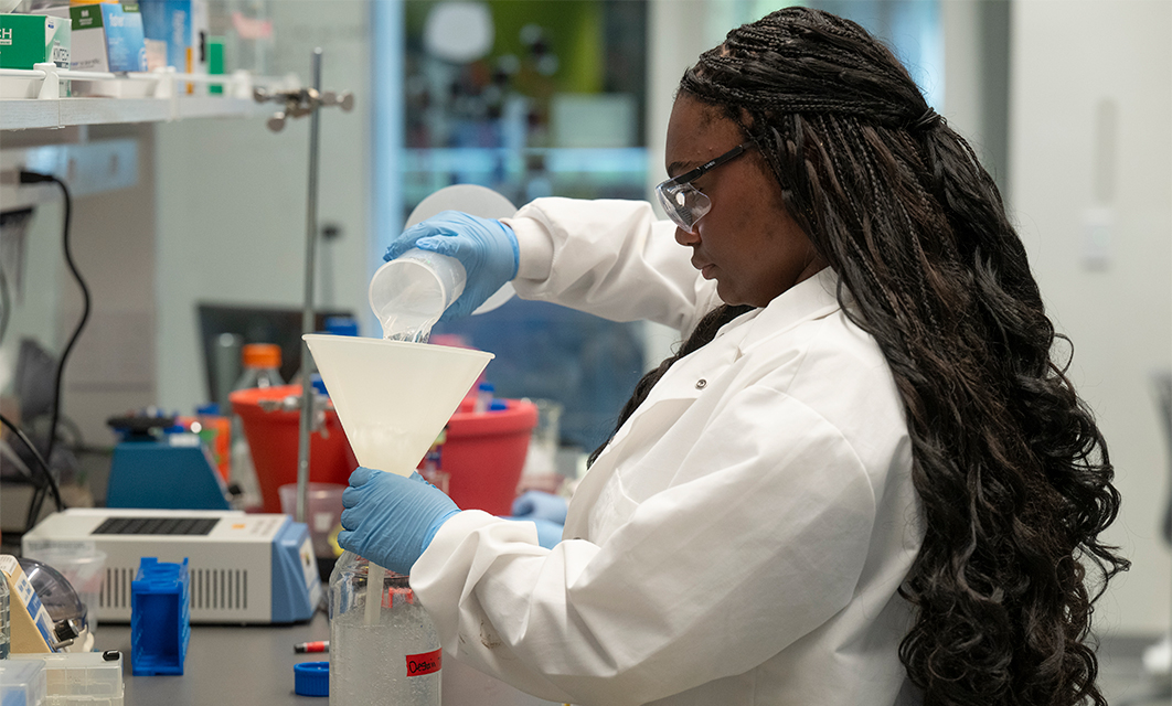 Jai Tavera ’27, a molecular biology and biochemistry major, preparing materials for her work to produce bacterial proteins in Dr. Oriana Fisher's lab