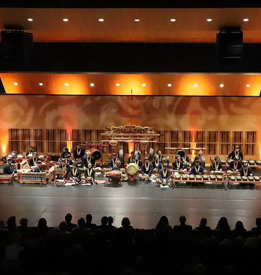 Interior of concert hall with seats seen from stage