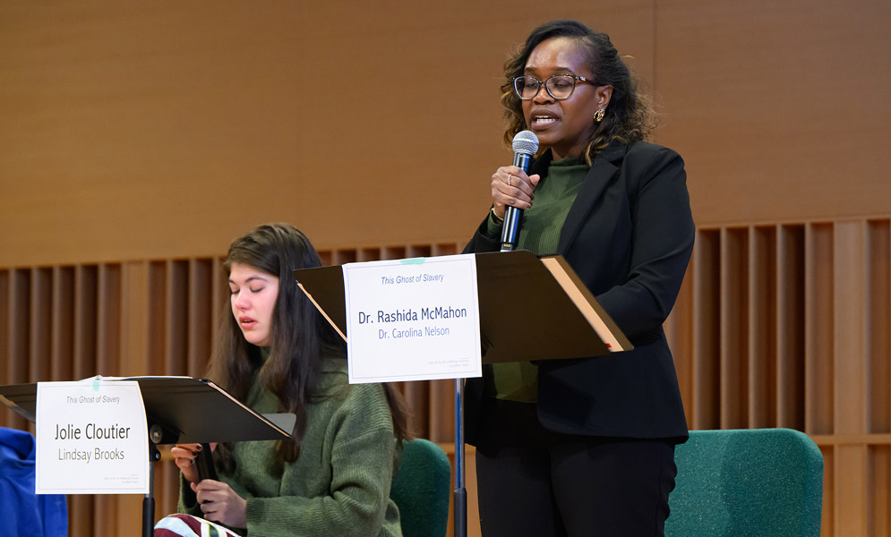 Actors speaking on stage