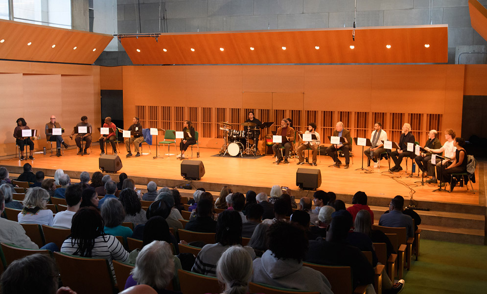 Actors speaking on stage