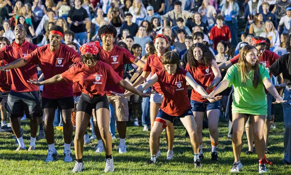 People dancing on field