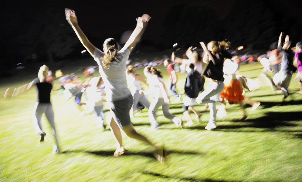 People running on field