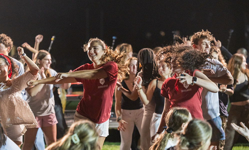 People dancing on field