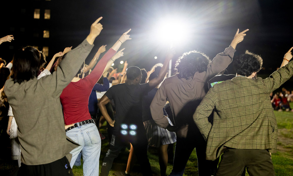 People dancing on field