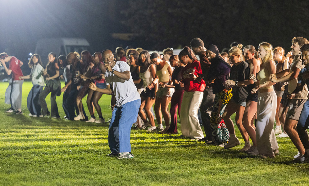 People dancing on field