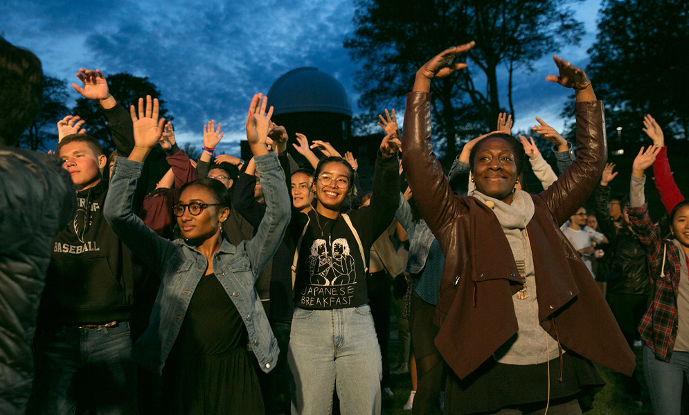 People dancing on field