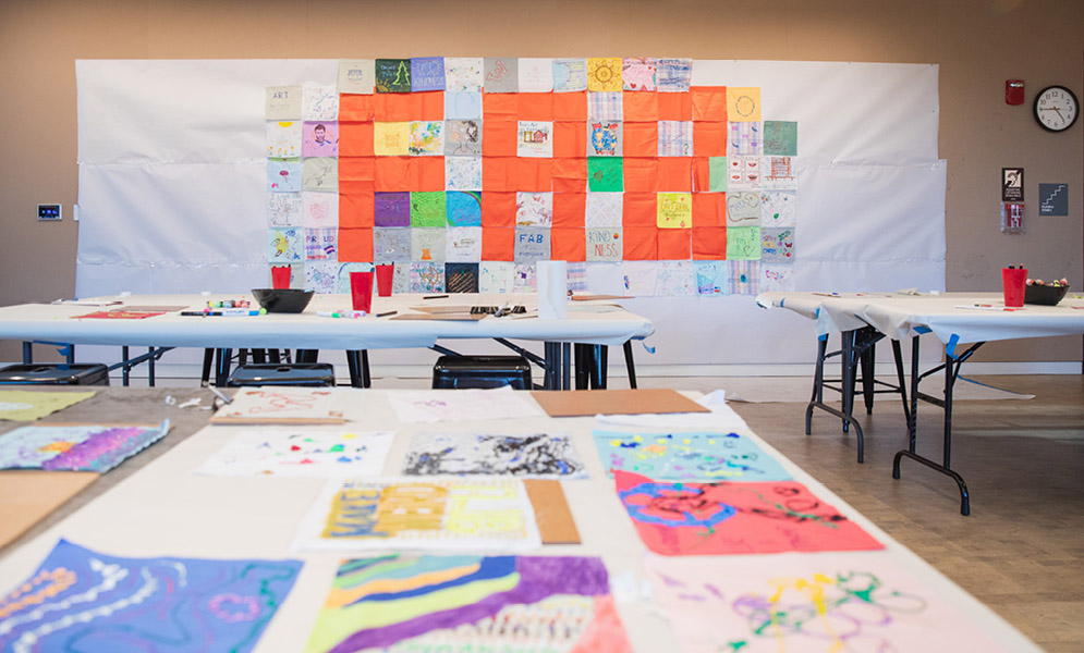 Quilts on table and wall