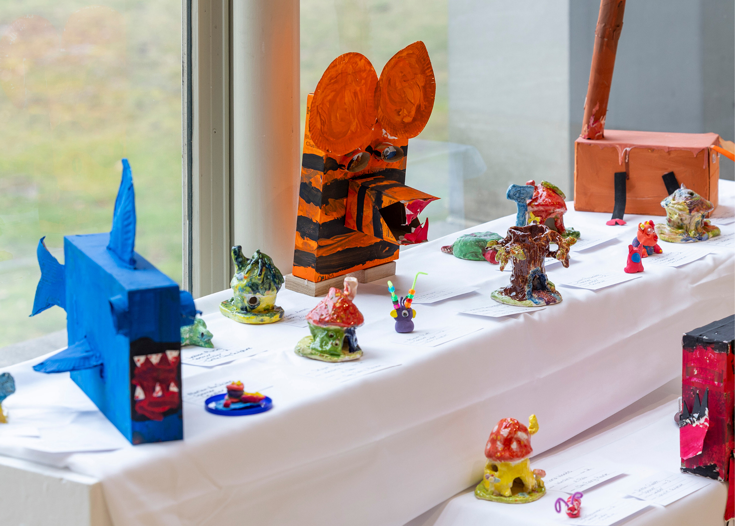 Person viewing art on gallery wall 