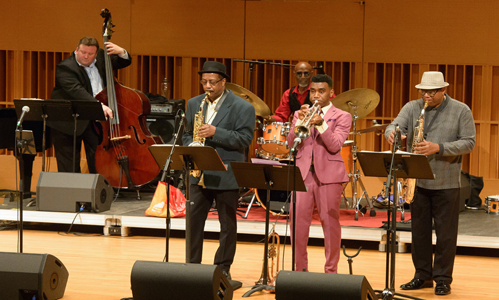 Musicians performing on stage