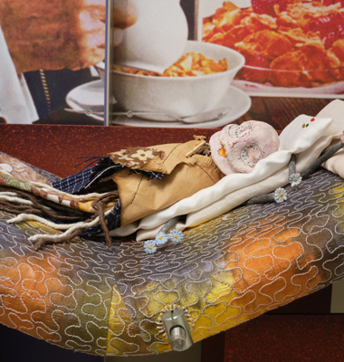 Helen Marten, detail of "Evidence of Theatre (they wept)," 2023, Sprayed aluminum; screen printed aluminum; sandcast aluminum; steel; cast jesmonite; stitched fabric; modelboard; walnut; ash; number tags; handmade paper; candy foil; coffee filter; nylon inks, 98 1/2 x 84 3/4 x 20 inches. Courtesy of the artist and Greene Naftali, New York.