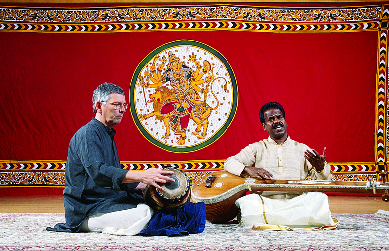 B. Balasubrahmaniyan and David Nelson performing.