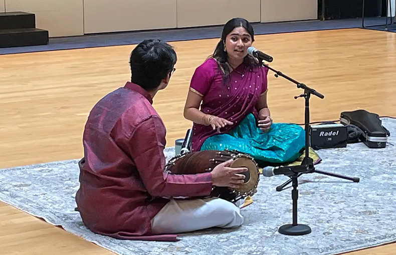 Students performing Indian music.