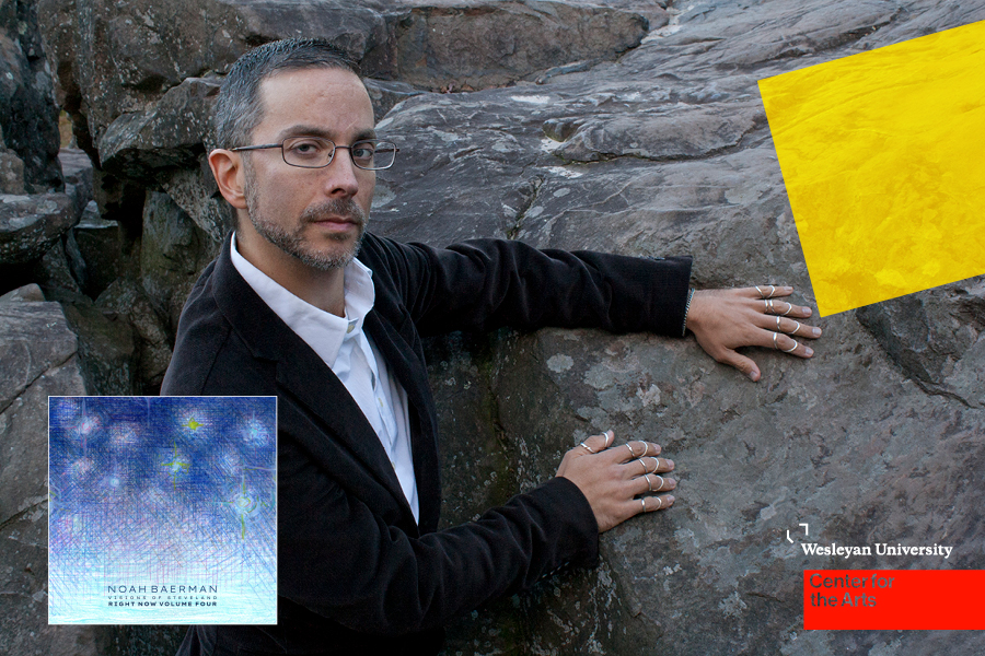 Noah Baerman standing in front of rock