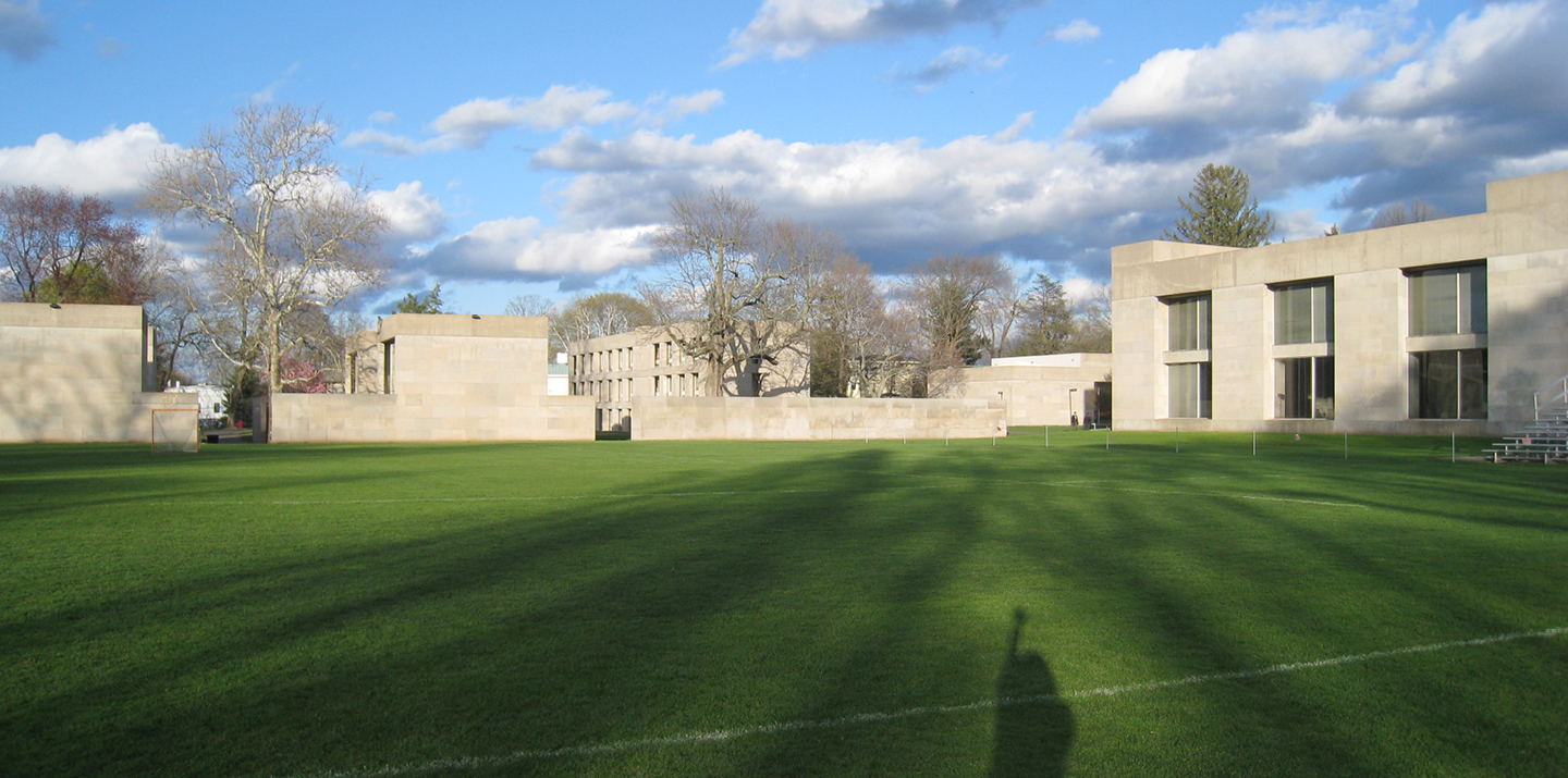 Center for the Arts looking east from field during sunset 