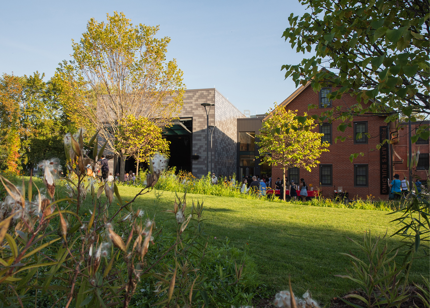 Exterior of art building with grass and trees 